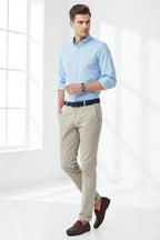 Model wearing brown loafers