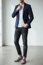 Model wearing grey loafers